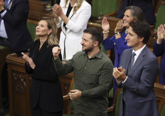 Ukrainian President Volodymyr Zelensky shakes his fist in recognition of Yaroslav Hunka, presented as a hero of Ukraine's independence from the Russians by Speaker of the House Anthony Rota, in the presence of Prime Minister Justin Trudeau, at Ottawa, September 22, 2023.