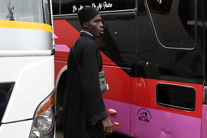 A Senegalese migrant in front of a bus that will take him to the border with Guatemala and continue on his way to the United States.  In Tegucigalpa (Honduras), August 24, 2023.