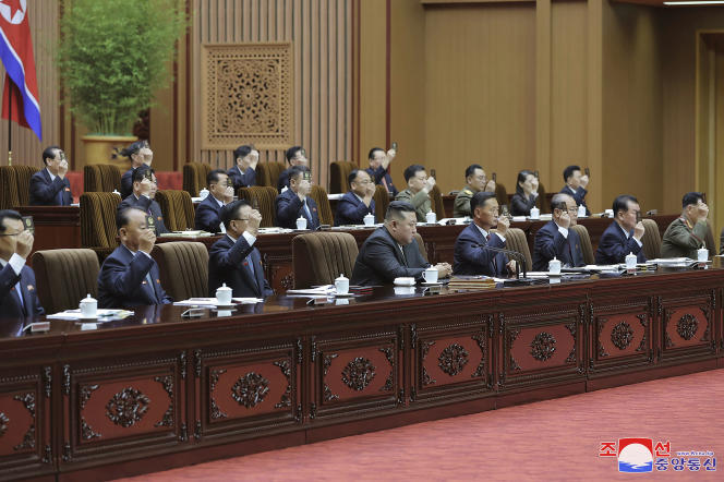 In this photo taken during a two-day session on September 26-27, 2023 and provided by the North Korean government, Kim Jong-un (bottom center) attends a meeting of the Supreme People's Assembly in Pyongyang.