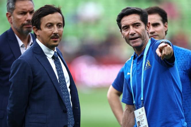 Pablo Longoria (left), the president of OM, and coach Marcelino Garcia Toral, before the start of the L1 football match between FC Metz and OM, at the Saint-Symphorien stadium in Longeville-lès- Metz, August 18, 2023. 