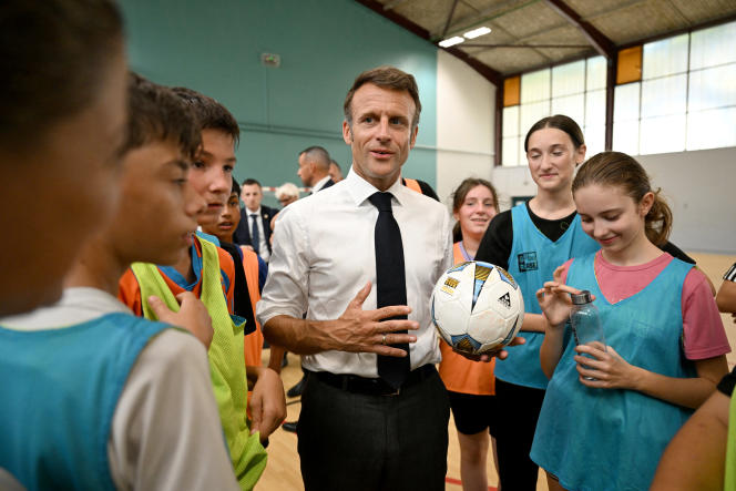French President Emmanuel Macron meets schoolchildren during his visit to Daniel-Argote College in Orthez on September 5, 2023. 