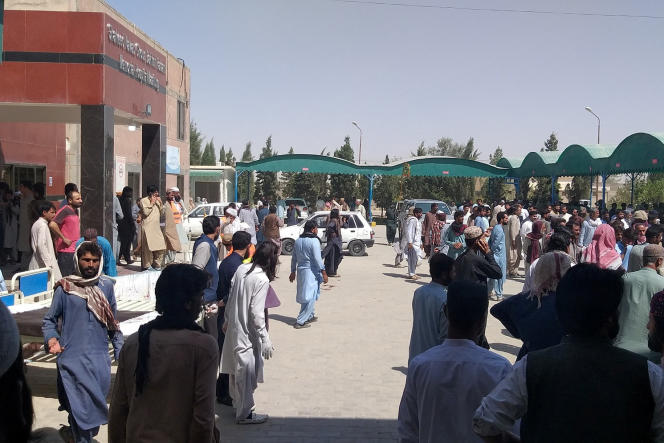 People gather outside Mastung Hospital, following an explosion during a religious gathering in Balochistan province, Pakistan, September 29, 2023.