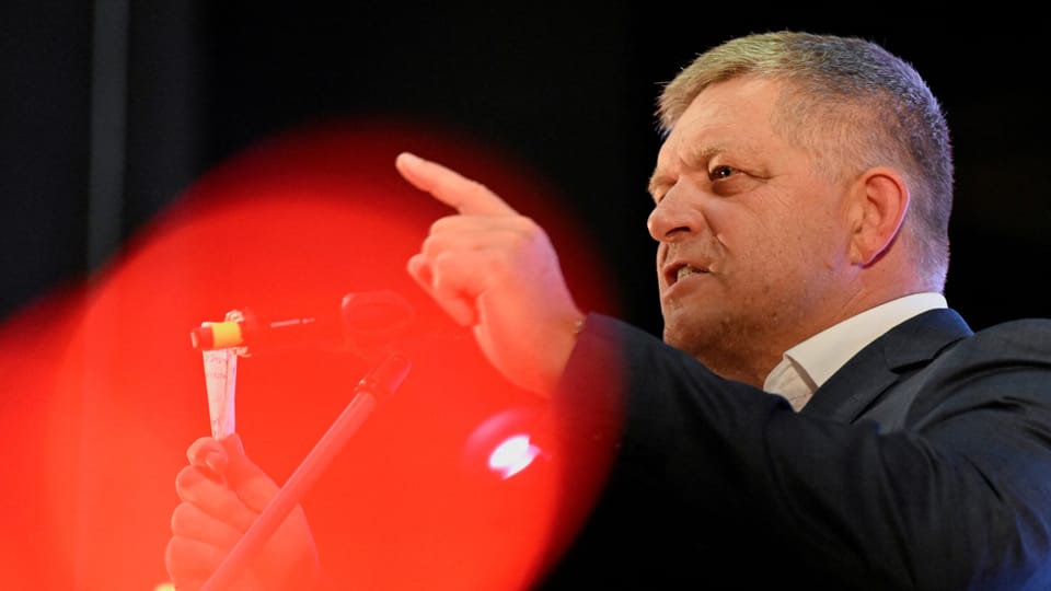 Close-up of Robert Fico.  He points his index finger at the audience during a speech.