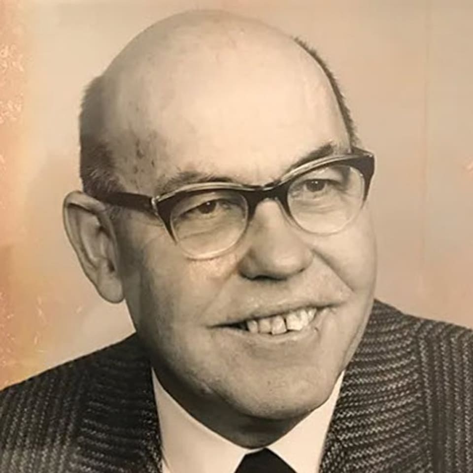 Portrait of Benedikt Fontana in a suit and tie