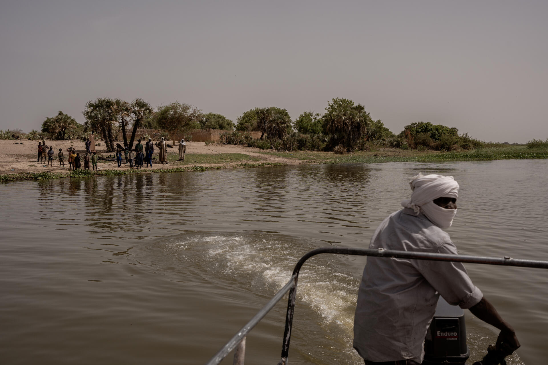 A boat leaves the island of Nahar, on Lake Chad, Chad, April 2, 2023.