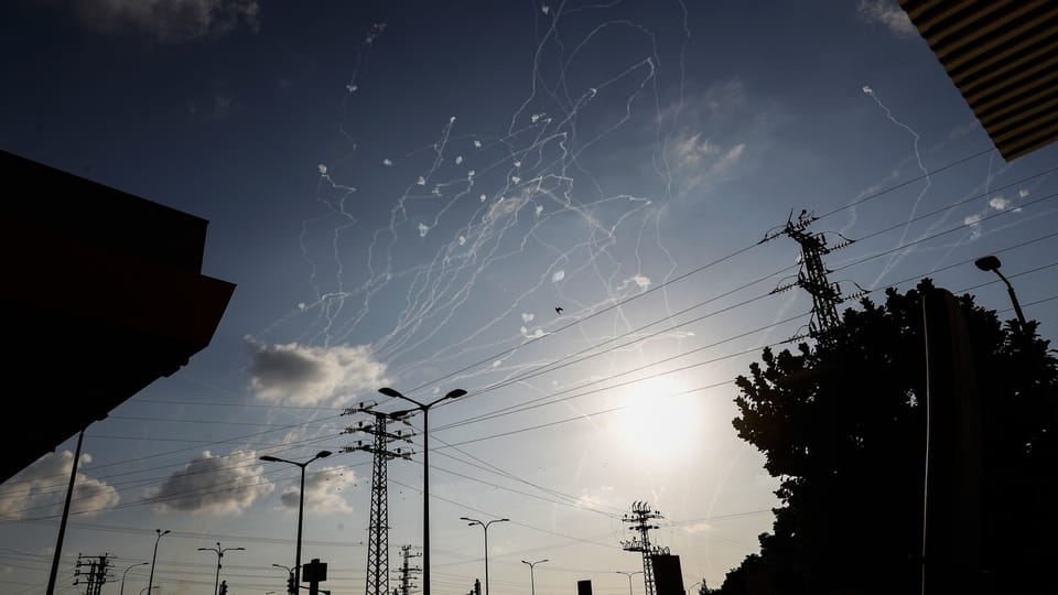 Hamas rockets are intercepted by the Iron Dome.
