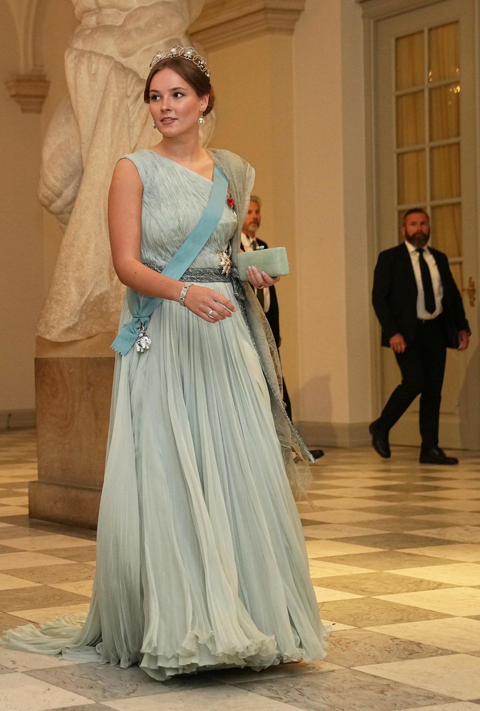 That's not possible in the royal rule book: Princess Ingrid Alexandra wears her sash on bare skin. 