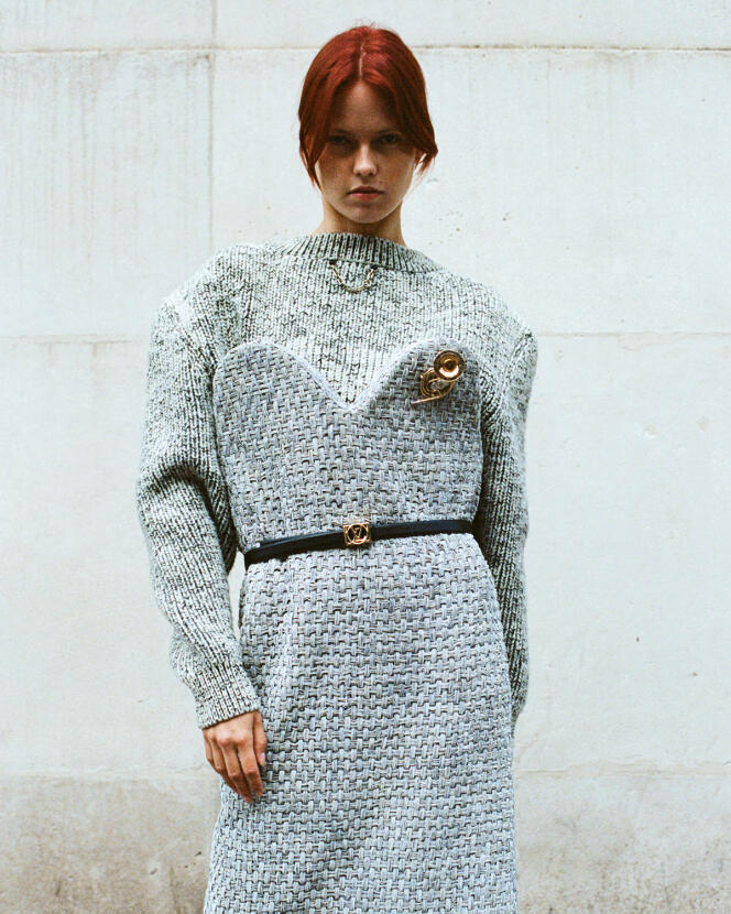 Louis Vuitton wool dress, sweater, belt and brooch, price on request. 
