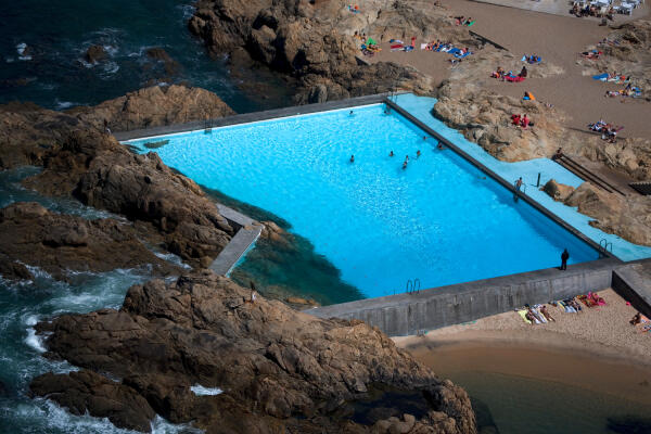 The natural swimming pool designed by architect Alvaro Siza in Leça da Palmeira in Portugal.