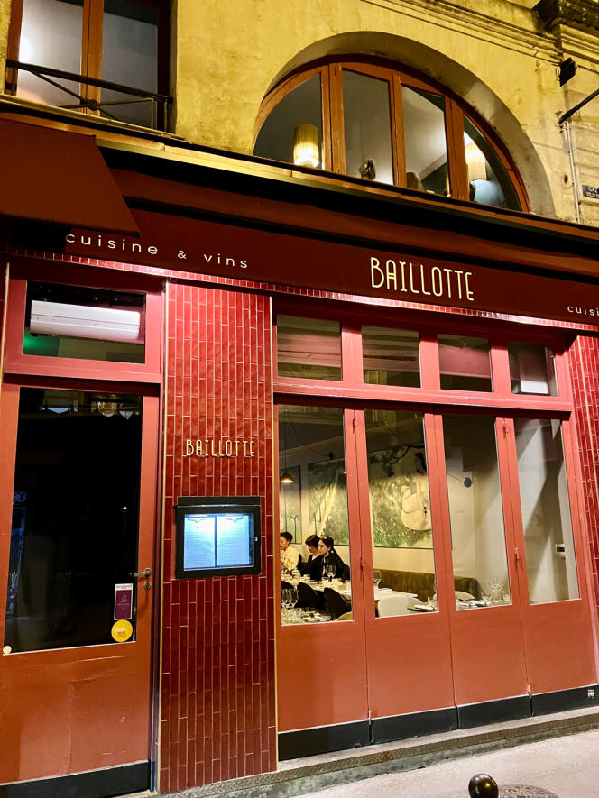 Rue du Dragon, in Paris, the red storefront of Baillotte blends into the classic decor of Parisian bistros.