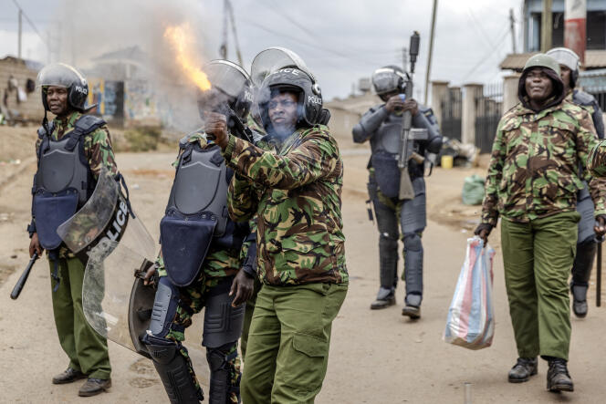 Kenyan police officers disperse demonstrators, in Nairobi, July 12, 2023.