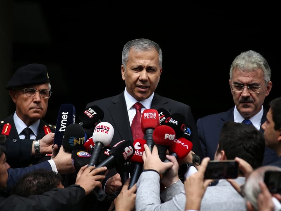 Ali Yerlikaya speaks to the media after the bombing.
