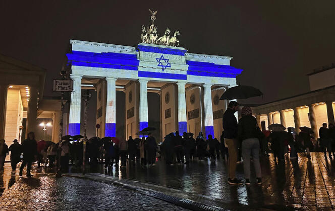 The Brandenburg Gate, illuminated in the colors of the Israeli flag as a sign of solidarity, in Berlin, October 7, 2023.