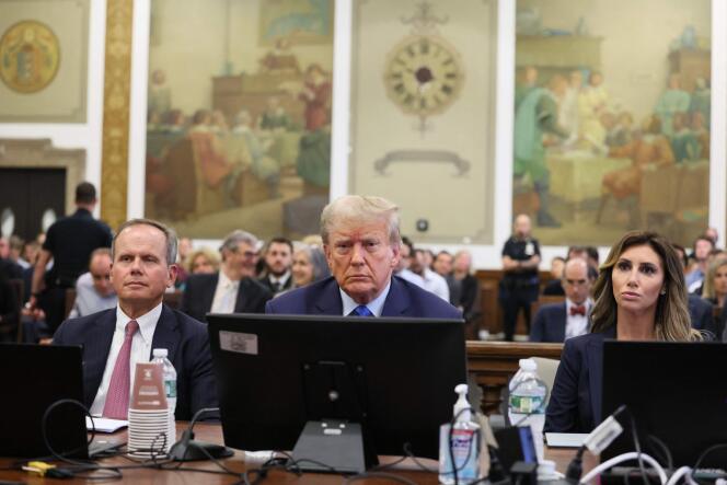 Former US President Donald Trump and his lawyers during his civil trial for fraud at the Manhattan Courthouse in New York on October 2, 2023.  