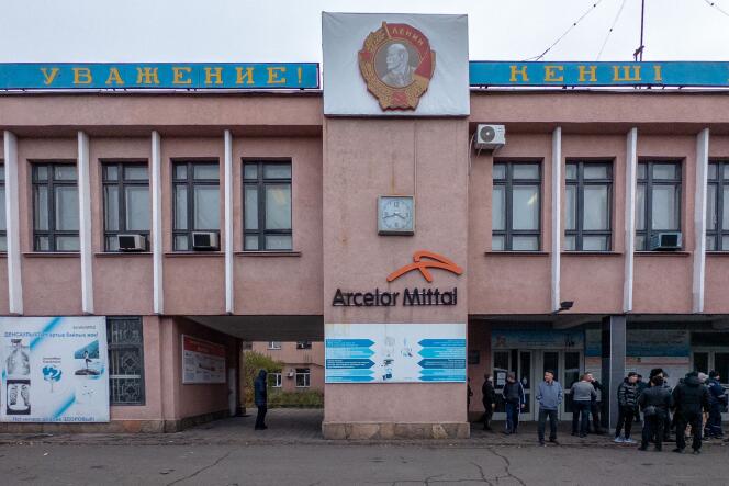 Employees and relatives of employees gather in front of the entrance to the ArcelorMittal mine in Kostenko, central Kazakhstan, Saturday October 28, 2023.