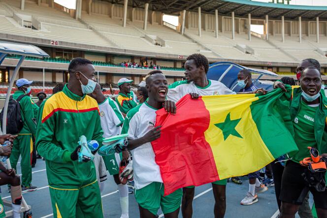 Players of the Senegalese deaf football team celebrate their victory during a Deaflympics match in Nairobi, Kenya, September 2021.