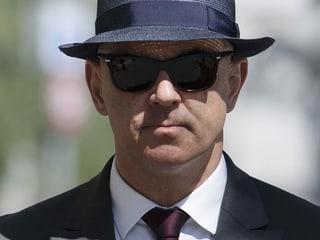 Berset with sunglasses and hat close-up