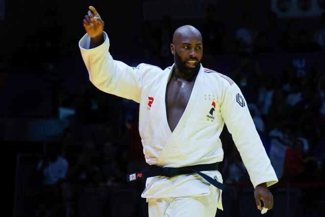 Frenchman Teddy Riner celebrates his victory in the +100 kilo final at the Judo World Championships in Doha, May 13, 2023.