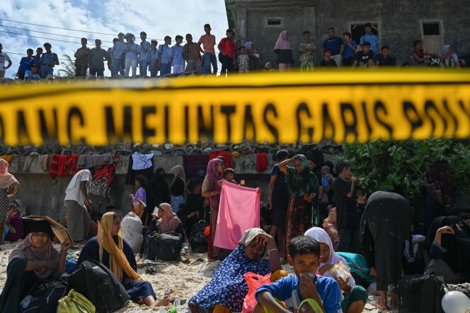 Recently arrived Rohinga refugees rest on a beach on Sabang Island, Aceh province, Indonesia, November 22, 2023.