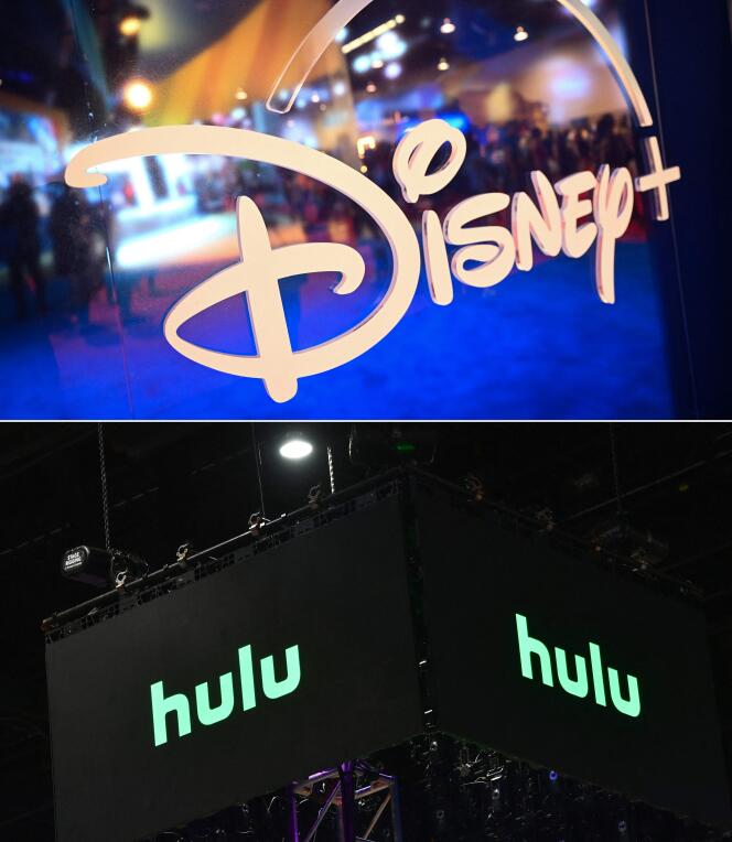 The logos of streaming platforms Disney+ and Hulu at a conference in Anaheim, California on September 9, 2022.