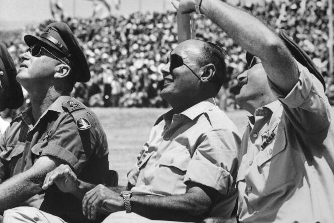 From left: Itzhak Rabin, Moshe Dayan and Israeli Air Force Chief Mordechai Hod, at a rally to celebrate Israel's military victory in the Six-Day War.  In southern Israel, July 1967.