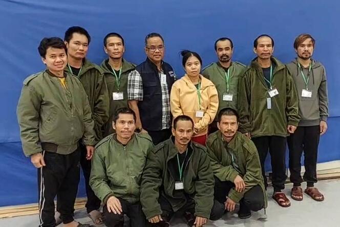 The ten Thai hostages (with a Thai official, center, in shirt), after their release on November 24, 2023 (photo released on November 25 by the Thai Ministry of Foreign Affairs).  
