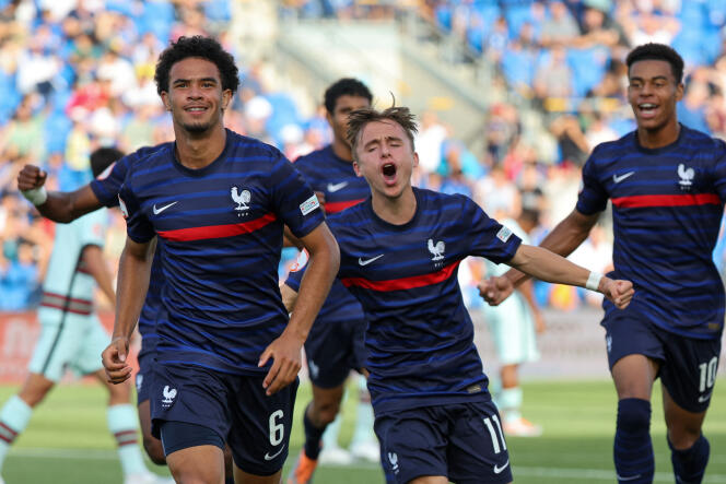 French midfielder Warren Zaire-Emery (left) celebrates opening the score during the European Under-17 Championship semi-final between France and Portugal, at the Netanya Stadium, Israel, on May 29, 2022. 