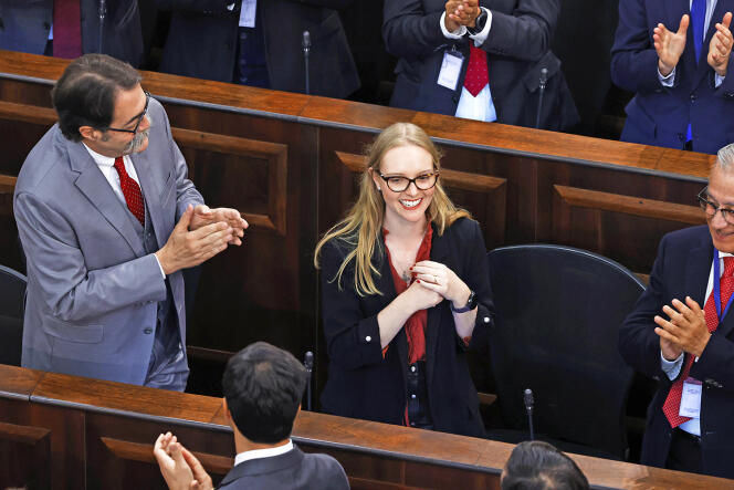 The president of the Chilean Constituent Assembly, Beatriz Hevia, applauded when she took office on June 7 in Santiago, Chile.