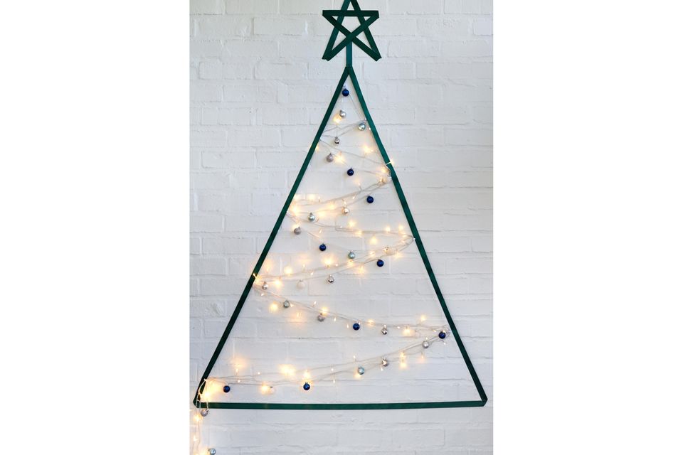 Christmas in a small space: Christmas tree made from washi tape and fairy lights
