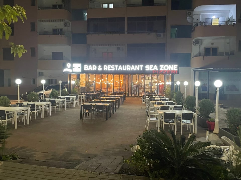 A picture of the restaurant terrace at night.