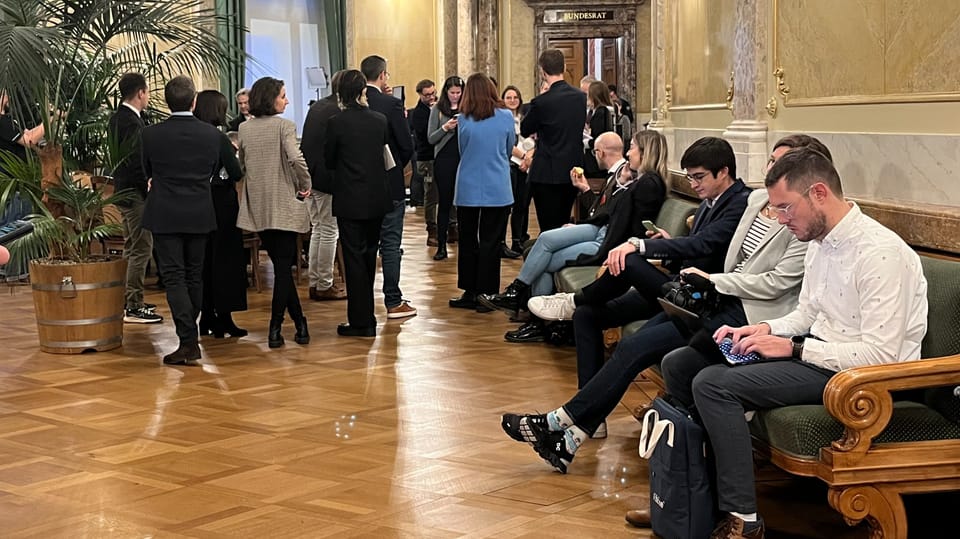 Journalists in the foyer