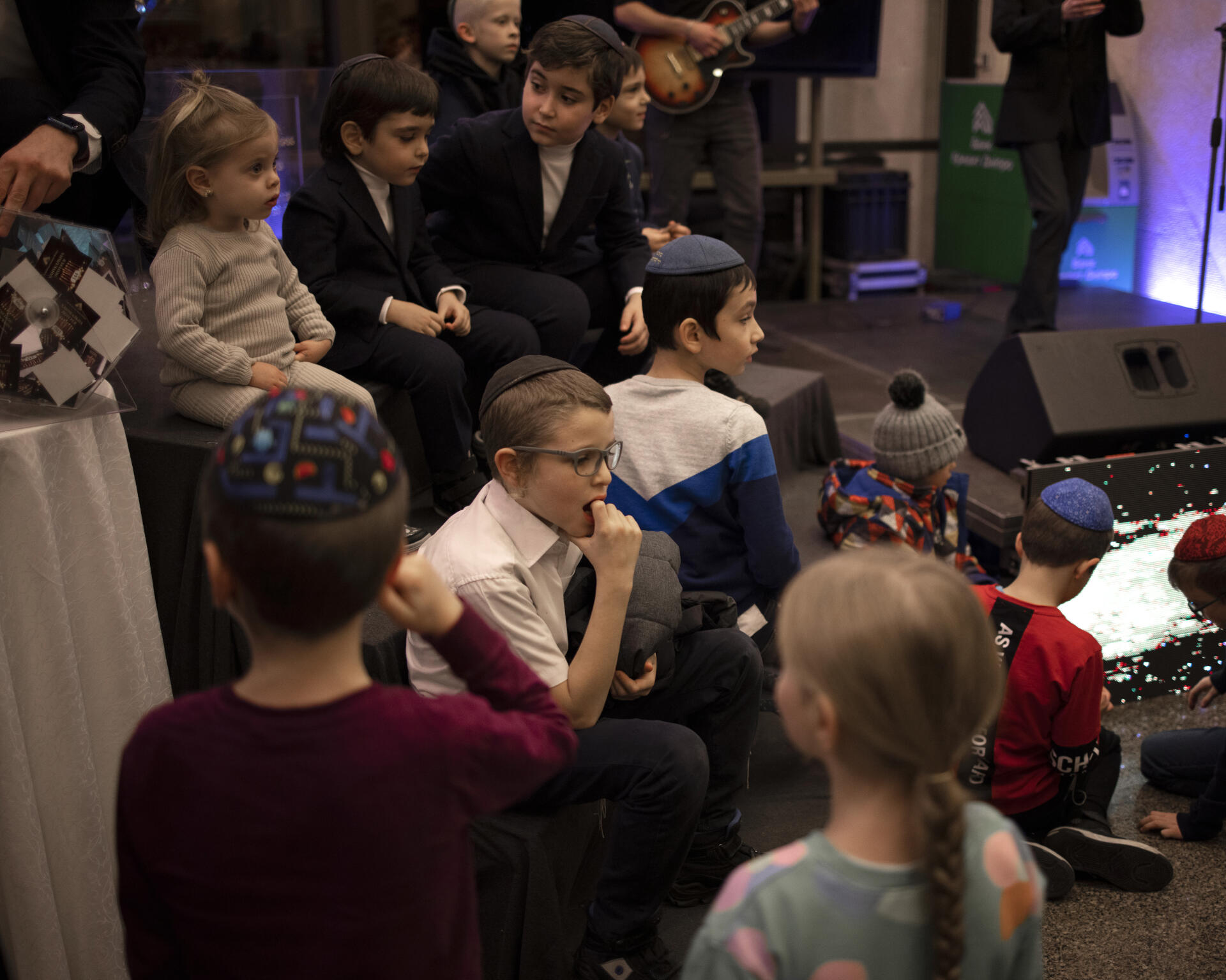 Children from the Jewish community attend the Festivities during Hanukkah celebrations, at the Menorah center in Dnipro, Ukraine, December 10, 2023.