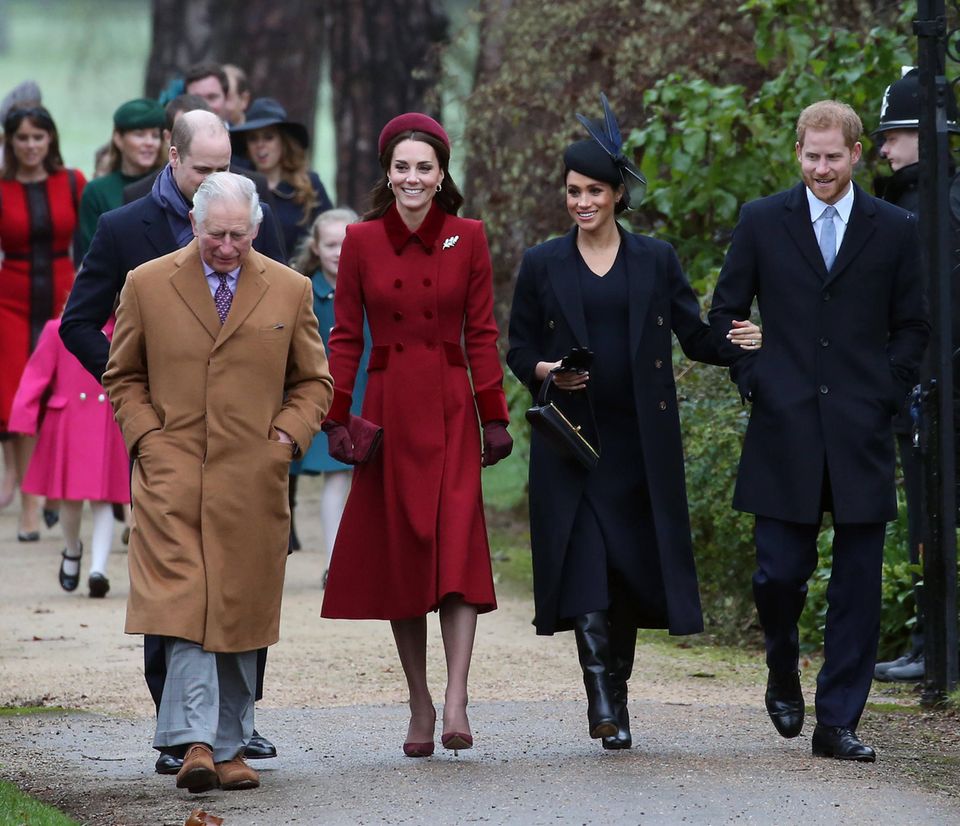King Charles, Prince William, Catherine, Princess of Wales, Duchess Meghan and Prince Harry at Sandringham 2018.