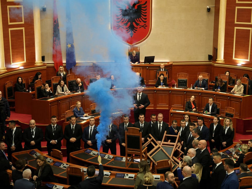 Blue smoke in the parliament hall.