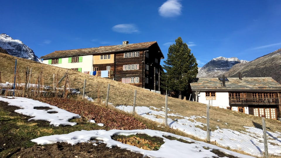 Mountain houses with little snow