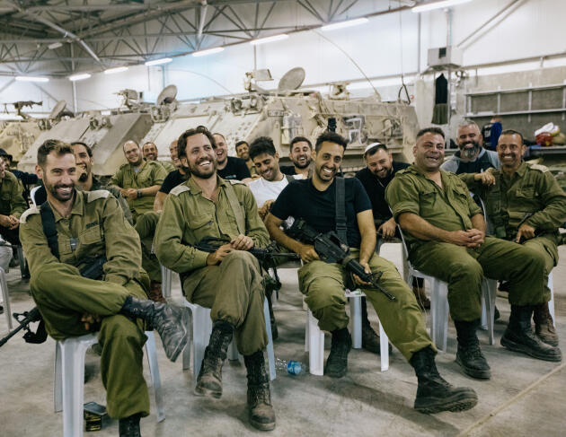Reservists from the Yasham 179 battalion attend a stand-up show at the Israeli military base in Nahshonim, on the dividing line between Israel and the West Bank, November 9, 2023.