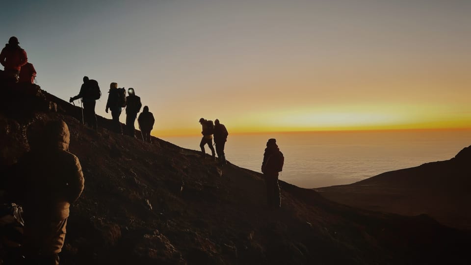 Climbing Uhuru Peak at dawn