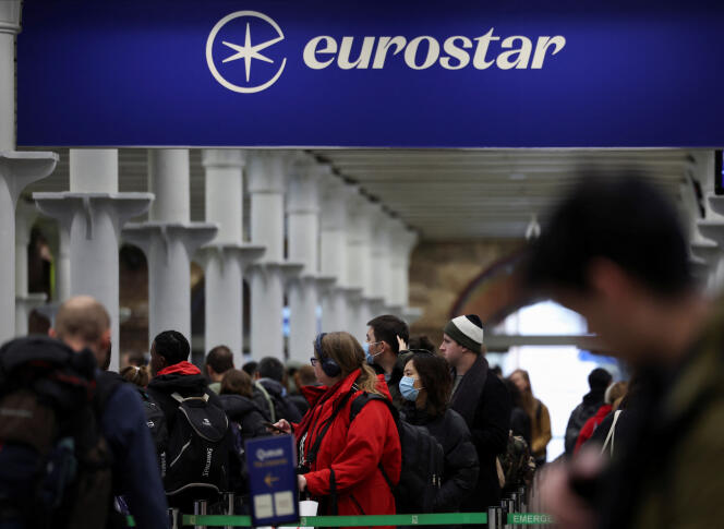 Passengers queue outside the departure gates of the Eurostar terminal at St Pancras International Station, as services resume after Thursday's strike at Eurotunnel, in London, Britain, December 22, 2023. 
