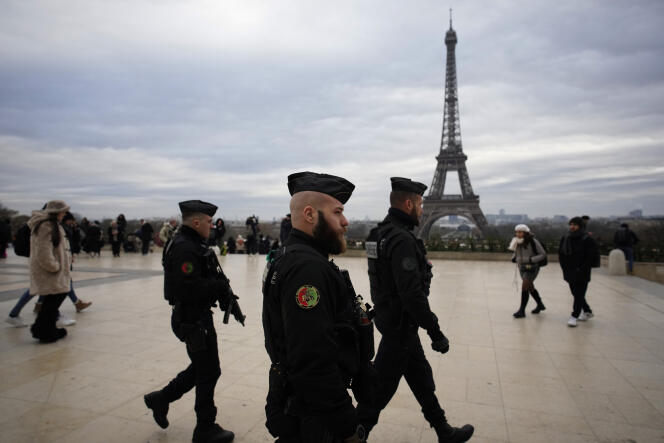 Gendarmes patrol the Trocadéro, in Paris, on December 3, 2023, near the scene of the attack which left one dead the day before.