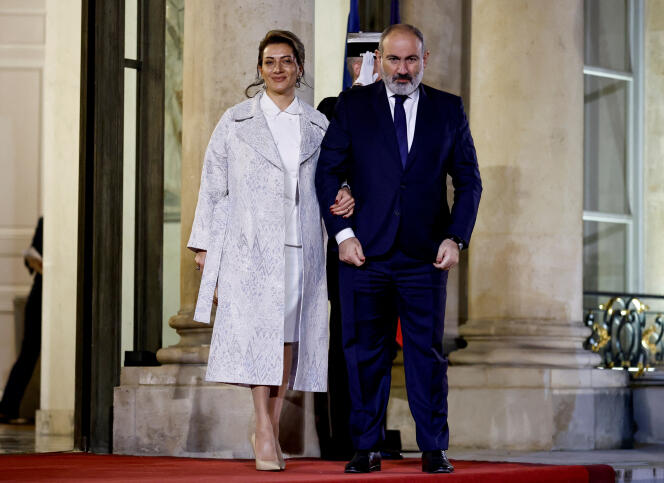 Armenian Prime Minister Nikol Pashinian and his wife, Anna Hakobian, in Paris, November 9, 2023.