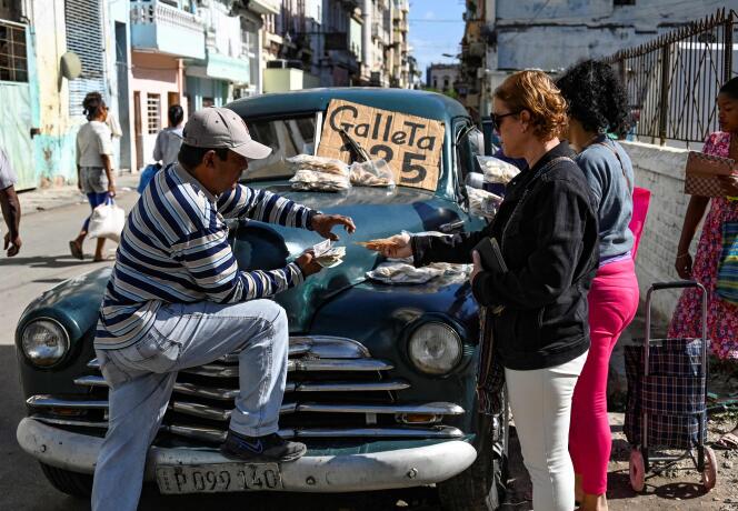 A man sells cookies in Havana, December 20, 2023. 