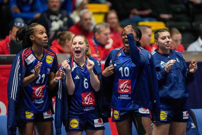 French handball players celebrate their qualification for the semi-finals of the 2023 World Cup after their victory against the Czech Republic in Trondheim, Norway, December 12, 2023.