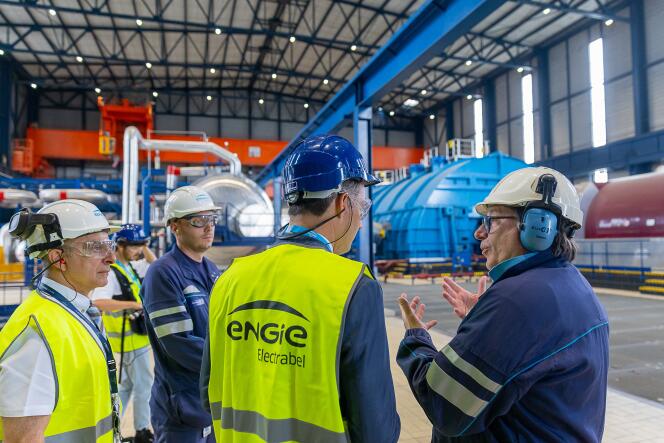 The director of the Tihange nuclear power plant, Antoine Assice (left), and the Belgian Prime Minister, Alexander De Croo (2nd right), attend a federal government visit to the Engie nuclear power plant, in the presence of employees , in Tihange, July 13, 2023.
