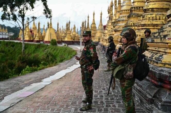 Members of the Ta'ang National Liberation Army outside a temple in the town of Namhsan, December 13, 2023.