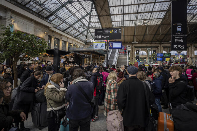Eurostar passengers wait in the concourse of Gare du Nord, Saturday December 30, 2023 in Paris, France, after high-speed services in the UK were canceled due to tunnel flooding.