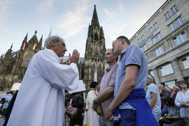 Same-sex couples during a public blessing ceremony in front of Cologne Cathedral, Germany, September 20, 2023. 