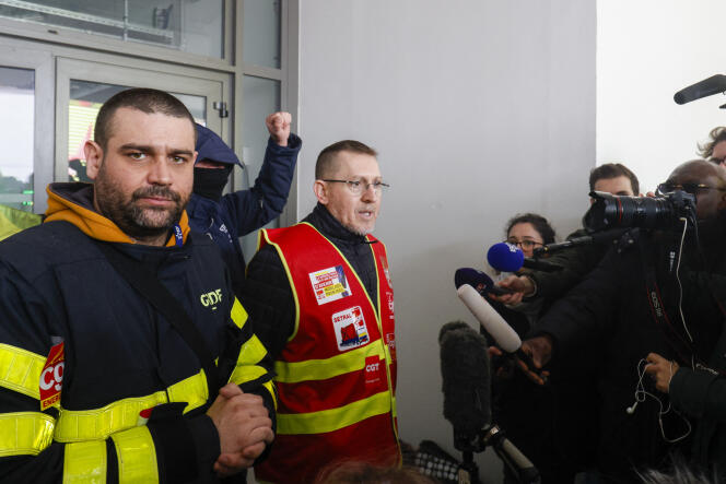 The general secretary of the CGT-Mines-Energies, Sébastien Menesplier (center), during an action in a power plant in Saint-Denis (Seine-Saint-Denis), on March 9.
