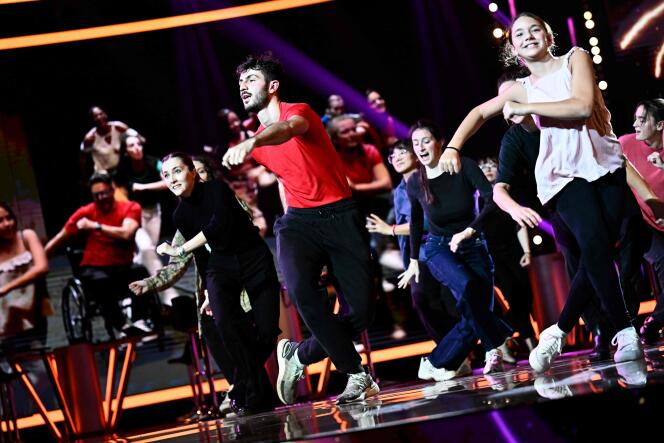 During a rehearsal session for the “Official Dance” of the Olympic Games, on the Telethon set, in Saint-Denis (Seine-Saint-Denis), on December 7.