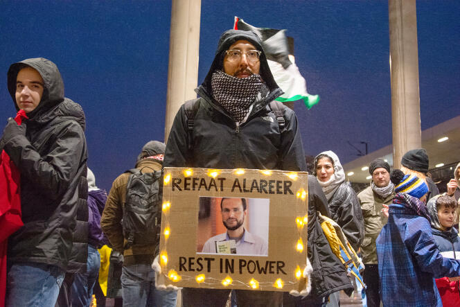 A portrait of Refaat Alareer displayed during a pro-Palestinian demonstration in Cologne, Germany, on December 9.