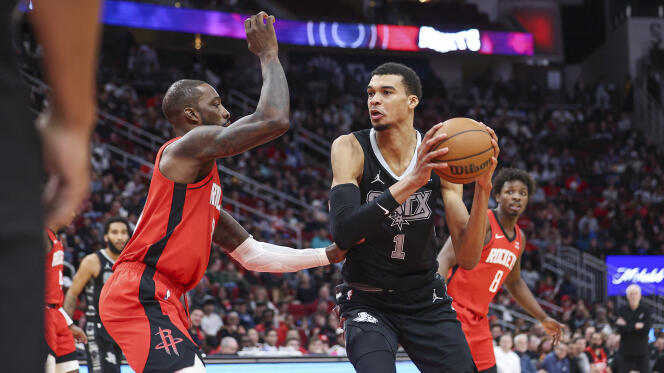 Victor Wembanyama of the San Antonio Spurs (right) against Jeff Green of the Houston Rockets, at the Toyota Center, in Houston, Texas, December 11, 2023.